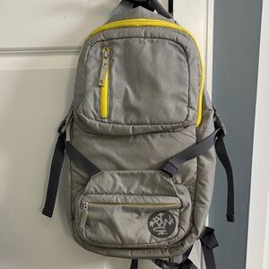 Manduka Gray and Yellow Sling Backpack for Yoga Mat